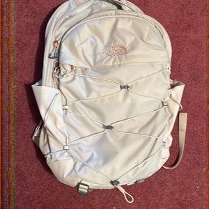 North face rose gold backpack
